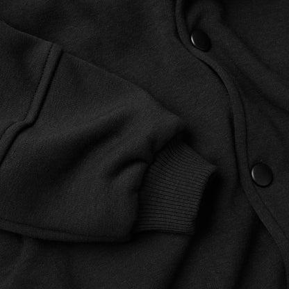 Detailed image of sleeve and fabric with buttons